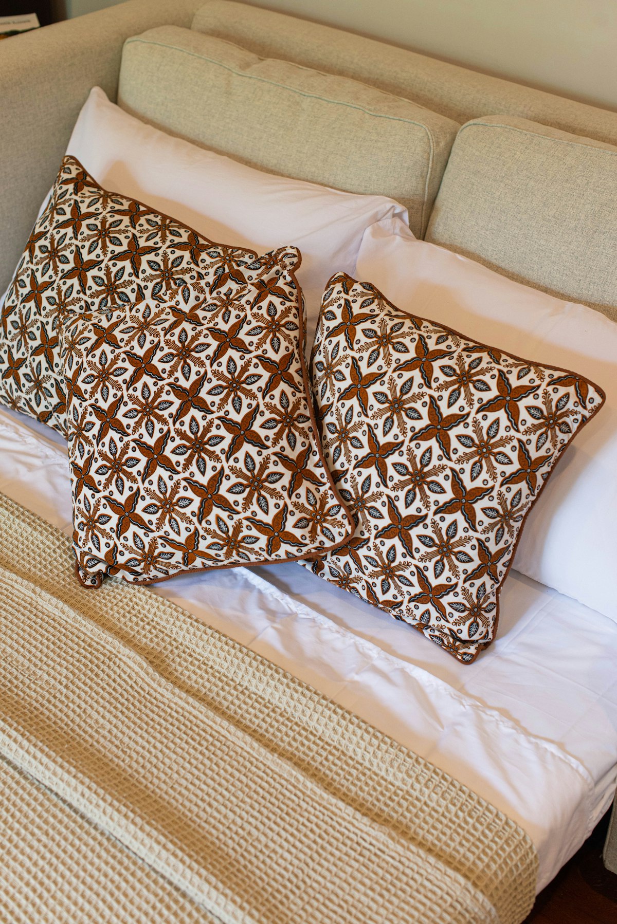 Made bed with pillows